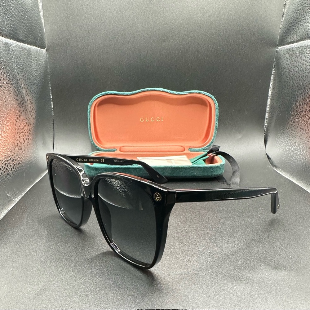 Gucci Black and Gold Sunglasses